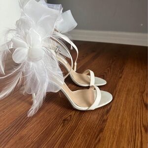 Nina's white beautiful shoes